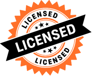 An orange and black badge with the word 